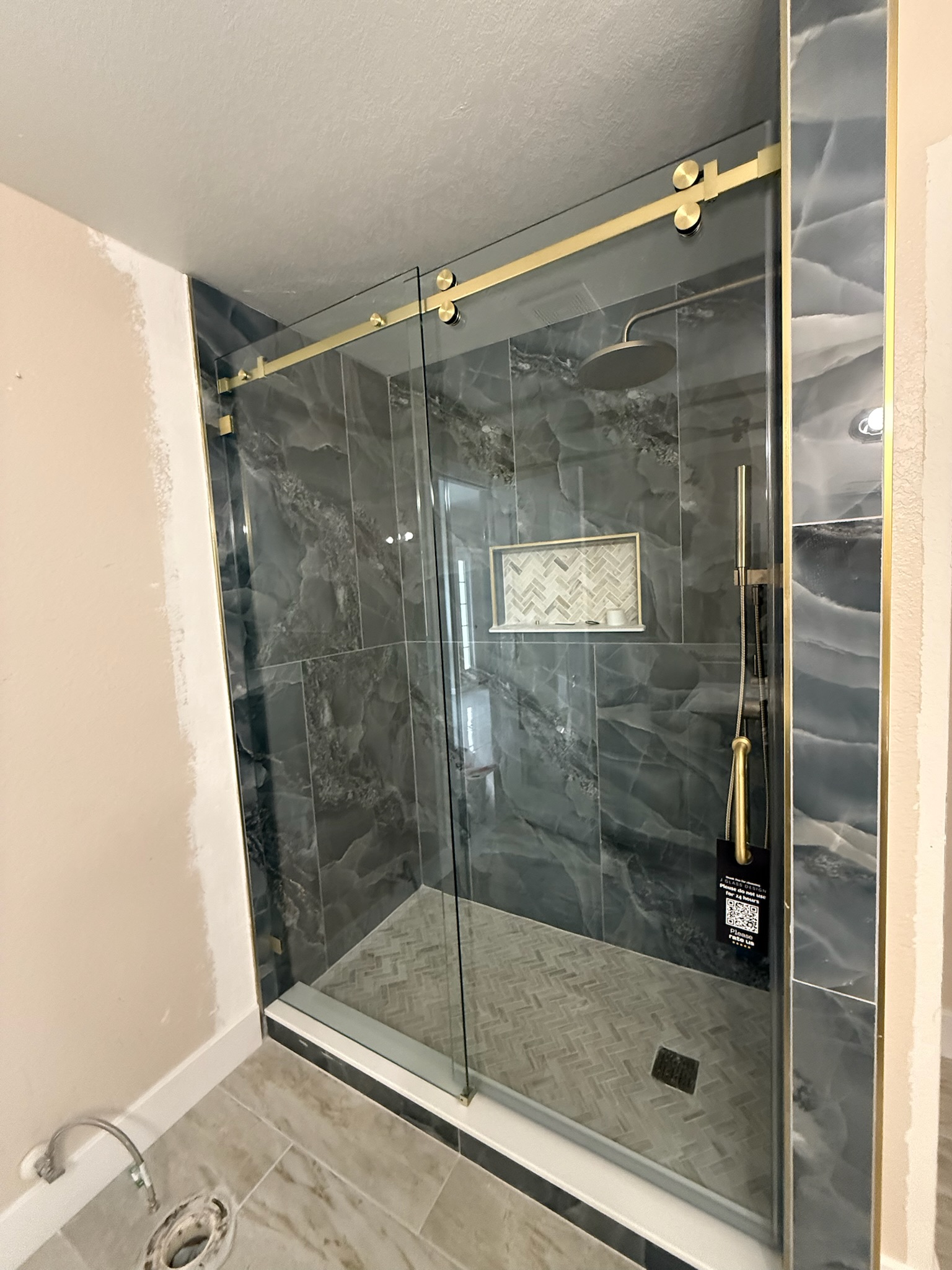 Glass railing installation on a modern staircase
