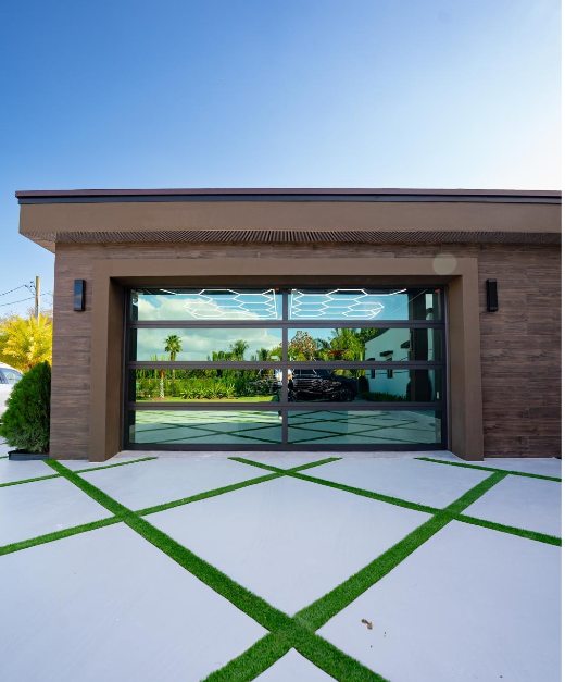 Modern home with contemporary glass garage door